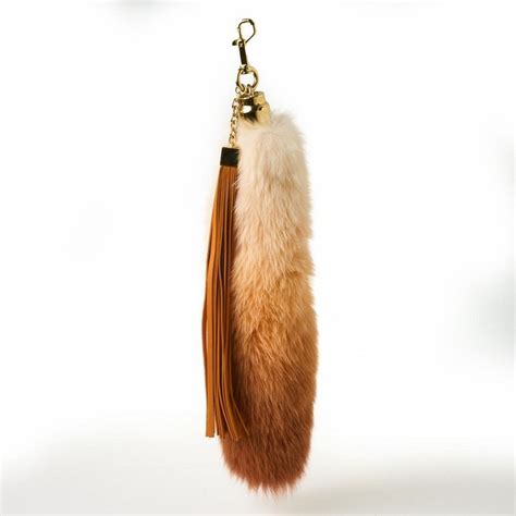 louis vuitton fox tail fur tassels messenger bag